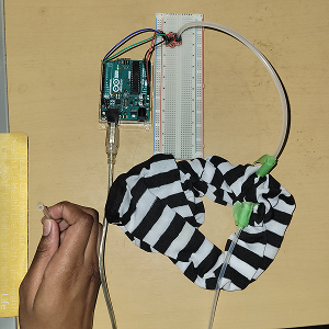 After that, I attached one of the tubes to the air pressure sensor so it can pick up the data. And for the other tube in my hand, I’d blow air into it to see if the sensor is affected.